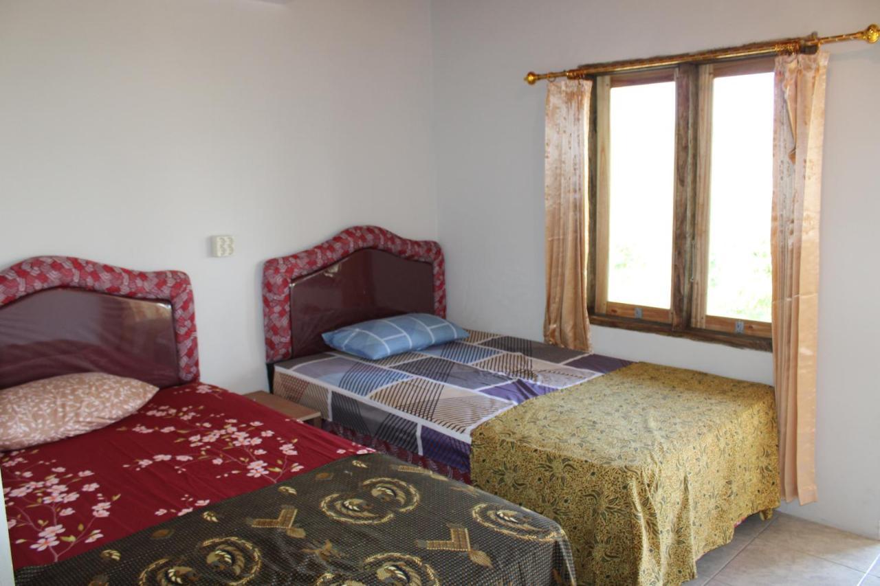 Feby'S Homestay Ekas ภายนอก รูปภาพ
